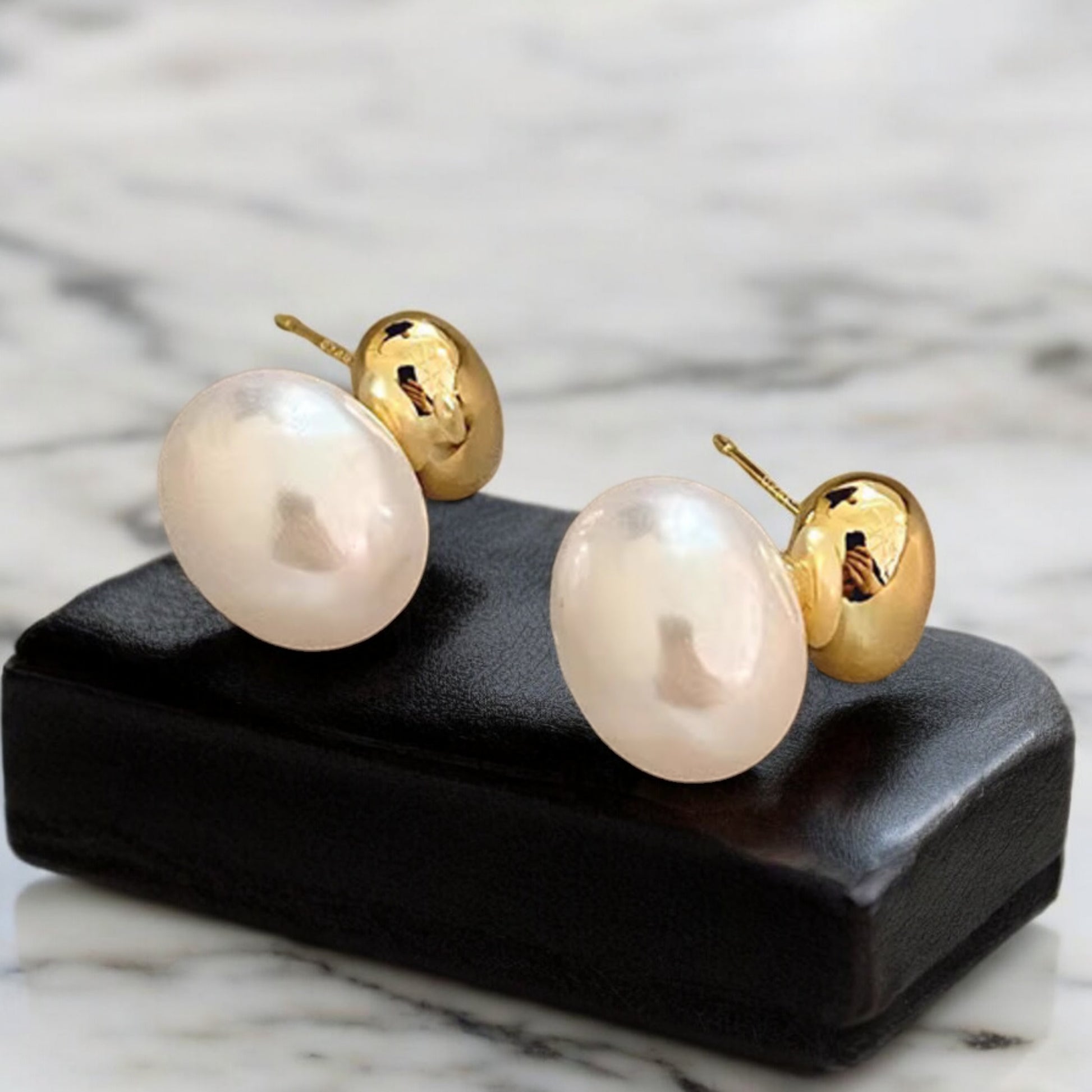 Luxe French Gold and Pearl Accent Earrings_Lifeluxe jewelry trending beautiful_Indulge in pure luxury with these stunning Luxe French Gold and Pearl Accent Earrings. The combination of classic flat pearls and a modern gold splice design creates an accessory that will elevate any outfit for any occasion.